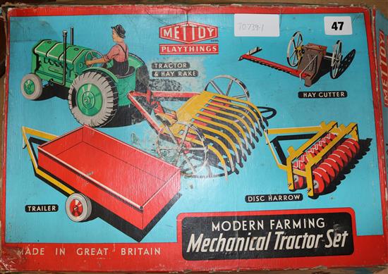 A Meltoy mechanical tractor set